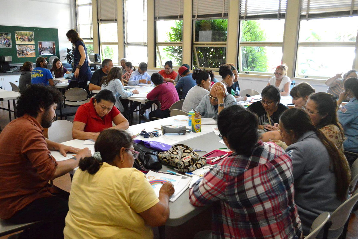 Students in a classroom learning the English language